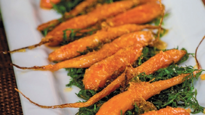 Ginger Glazed Carrots on Sautèed Carrot Greens